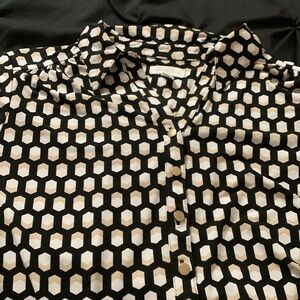 Gorgeous black, brown, white with gold snaps. Gently worn.